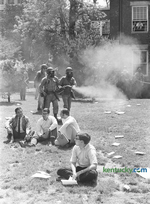 University of Kentucky students meeting with their class outside on campus are caught up in the spraying of tear gas by National  Guardsmen. The Guard was ordered to help break up student demonstration on  campus May 7, 1970. Photo by Paul Lambert, Herald-Leader staff
