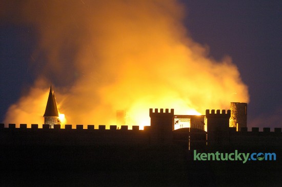 The landmark castle on Versailles Rd. in Woodford County on fire May 10, 2004. Deceased Lexington contractor Rex Martin Sr. started building the castle in 1969. But it was never finished and sat empty for more than 30 years. Tom Post spent millions of dollars and several years rebuilding the landmark into a luxury inn. Improvements started by Post were nearly complete when the fire destroyed the building. The state fire marshal's office concluded there was "a high probability" that an arsonist set the fire, but nobody was ever charged. Now the castle is called CastlePost and features 10 luxury rooms and suites and is a popular for wedding receptions and charitable events. Photo by David Perry, Herald-Leader staff