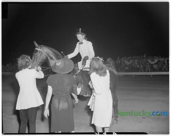 Five Minutes to Midnight, owned and ridden by Miss Jean McLean of Portsmouth, Virginia, captured the Three-Gaited Amateur Stake at the Lexington Junior League Horse Show, July 1946. The horse show started in 1937, to help fund the Junior League's community works project. It has grown to be the world's largest outdoor American Saddlebred show and the first leg of the Saddlebred "Triple Crown". This years horse show begins Monday, July 7 and concludes Saturday.