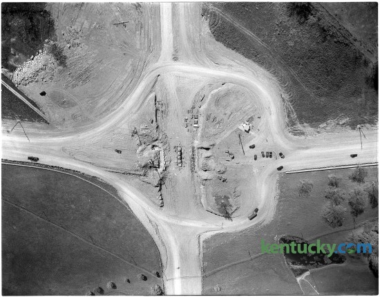Aerial view of construction of the intersection of New Circle Rd. and Winchester Rd, Jan. 1951. The intersection was a clover leaf design until June 2000 when it was changed into the "urban diamond" interchange it is today. The new interchange was the first urban diamond in Lexington and one of a handful in the state. Urban diamonds are often used in tight situations, where there's little space to expand the interchanges.