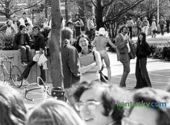 A  masked streaker evoked humor on March 5, 1974 from University of Kentucky students as he ran across the patio on central campus apparently  as a protest to the UK Board of Trustees, which was meeting at the Patterson Office Tower on March 5, 1974. The trustees were unaware of the incident. The high point of streaking's pop culture significance was in 1974, when thousands of streaks took place around the world.  Photo by E. Martin Jessee | Staff