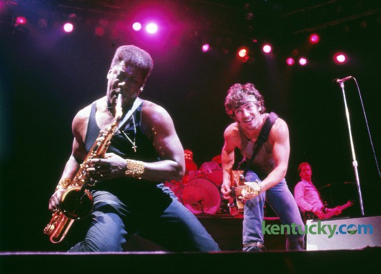 Bruce Springsteen watched Clarence Clemons play the saxophone during a December 11, 1984 concert before 23,000 fans in Rupp Arena in Lexington. Clemons, a prominent member of the E Street Band, died in 2011 of a stroke. Photo by Charles Bertram | Staff