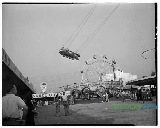 Lexington's Joyland Amusement Park was located in north east Fayette County off of North Broadway. This photo was taken in August of 1948 during the Kentucky Press Association sponsored picnic and square dance contest.  It was considered the "Best known park in the Bluegrass" with two roller coasters, the Wildcat, and the Kiddie Coaster.The park closed in August 1964 and was torn down in 1965 replaced by the Joyland neighborhood. 