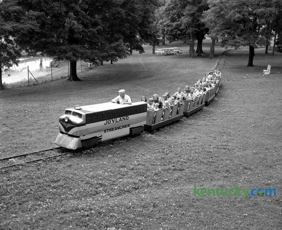 A group of orphans received a ride on the miniature train at Joyland Park in Lexington in August of 1950. Joyland Park was the best known park in the Bluegrass and operated from 1923-1964. Published in the Herald-Leader August 16, 1950. 