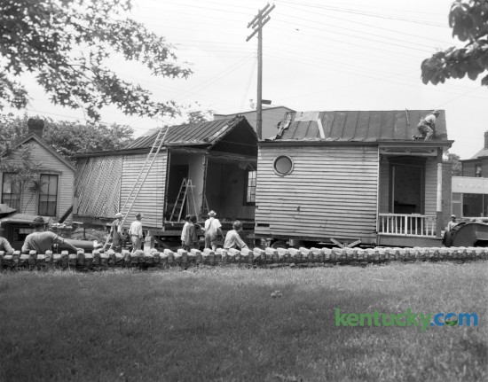 Workmen had to saw this house in half in order to move it from 307 North Limestone Street to a lot on Roosevelt Blvd in 1950. Published in the Lexington Herald May 27, 1950. 