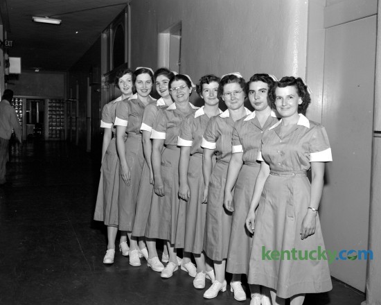 The first class of the Appalachian School of Practical Nursing was graduated at the Good Samaritan Hospital.  Shown, left to right, are Miss Cora R. Davidson, Miss Ina Mae Glover, Miss Jacquelyn Perry, Mrs. Addie Lewis White, Mrs. Maude Spurlock, Miss Roma Jean Gross, Miss Mary Jane Wurtele, and Miss Eddie Landrum. Published in the Lexington Herald July 2, 1952. 