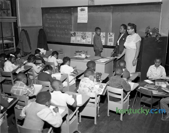 Mrs. R. A. Buford's second grade class  from Douglass Elementary School, began classes in January 1955 in the old Russell School building because their school was destroyed by fire on January 1. Published in the Lexington Leader January 6, 1955. 