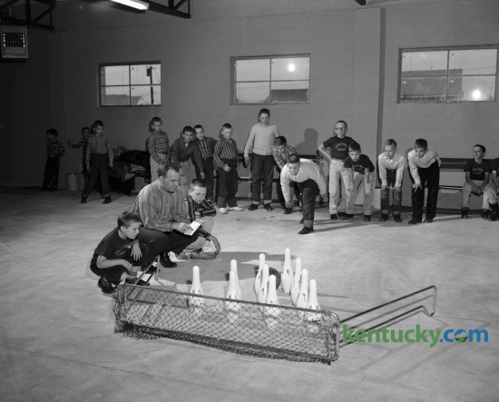 Youngsters shown with bowling set at the new Meadowthorpe Recreation Center, sponsored by the County Playground and Recreation Board. Published in the Lexington Leader January 21, 1958. 