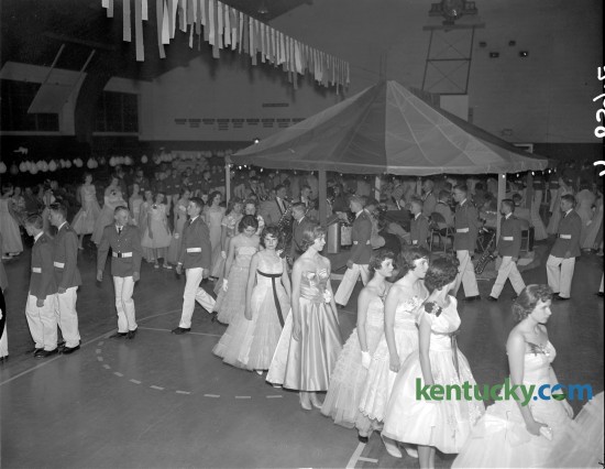 Millersburg Military Institute Cadets entertained with their Annual Ball on April 9, 1960. The Grand March brought all cadets and their dates to the dance floor. The Military Ball was held annually by MMI Junior School and music was furnished by the school orchestra. 