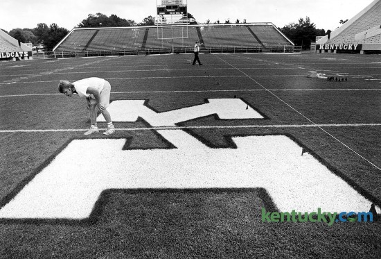 James Flora of Lexington checks the big K at midfield of Commonwealth Stadium Sept. 5, 1991 before UK football's season opening game against Miami of Ohio. Note the endzone seats are not closed in. That part of the stadium was renovated in 1999. Photo by Tom Marks | Herald-Leader staff