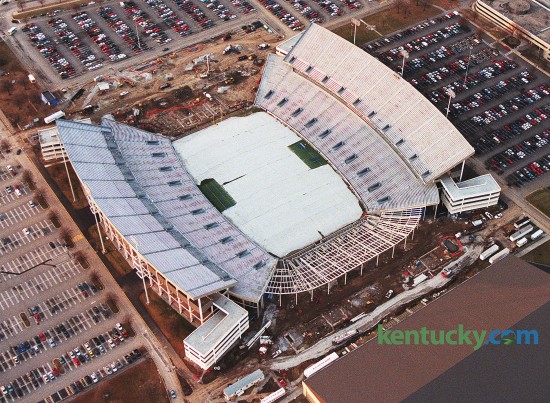 Commonwealth Stadium expansion in Jan. 1999 as both endzones enclosed. Also added were 40 suites, 10 in each corner of the stadium. The expansion, whcih cost $27.6 million, also included new video boards, new scoreboards and additional restrooms and concession stands. It also raised seating capacity to 67,942. Since the 1999 expansion, the Wildcats have averaged 64,828 fans per game. Photo by Charles Bertram | Herald-Leader staff