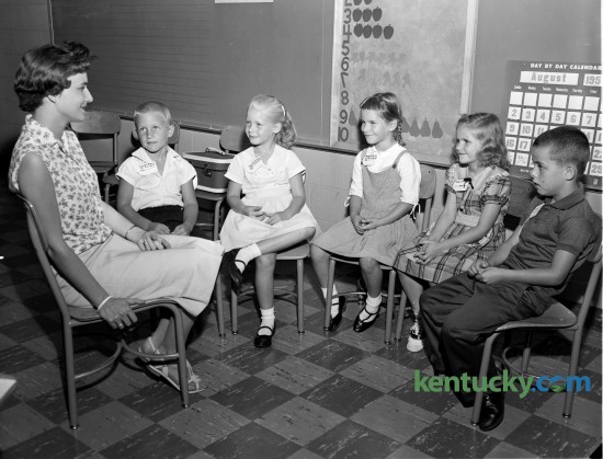 First graders at Leestown School met their new teacher, Mrs. Joseph W. Webb at the start of the school year in August 1959. Published in the Lexington Leader August 28, 1959. 