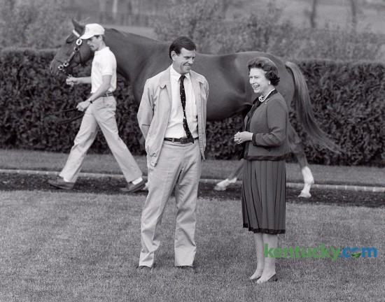  Queen Elizabeth II with William Farish III at her side inspected mares at Farish's Lane's End Farm in Woodford County October 9, 1984. The queen was on a six-day visit to the Bluegrass and toured several area horse farms and presented  a silver, Georgian trophy to the winner of a new Keeneland race named in her honor - the Queen Elizabeth II Challenge Cup. Photo by David Perry | Staff