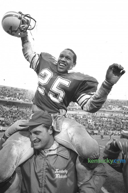 The University of Kentucky's Marc Logan got a ride off the field on the shoulders of running backs coach Greg Nord after the Wildcat's 10-3 victory over the University of Florida on Senior Day, November 15, 1986 at Commonwealth Stadium. The win snapped a six-game losing streak against the Gators. Unfortunatily for Kentucky they have not beated Florida since that game 24 years ago. This was Logan's last game at home. He is seventh on UK's career rushing list with 1,769 yards. He went on to play 10 years in the NFL, winning a Super Bowl with San Francisco in 1995. Photo by Charles Bertram | staff