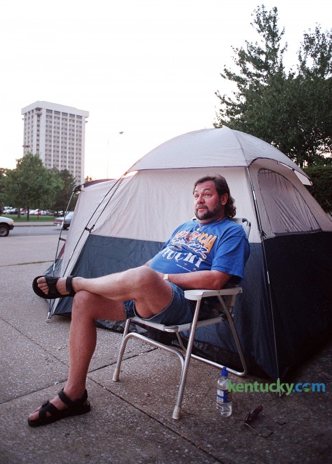 Wally Clark, also know as Wildcat Wally, began his three week-long campout Sept. 27, 1997 in front of Memorial Coleseum for tickets to UK basketball's Midnight Madness. Clark had his streak of campouts end at 18 years when he was a no-show in 2010 because of health problems. He had been first in line for Madness tickets several times. One year, he camped out for 39 days to make sure he was first in line. Photo by Sam Haverstick