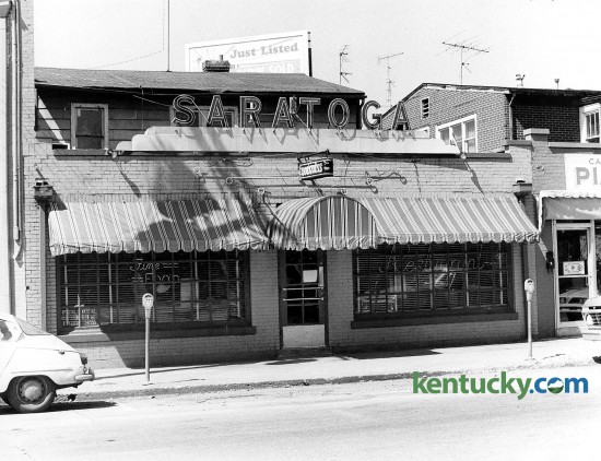 The Saratoga restaurant photographed April 10, 1978 at 856 East High Street was a Chevy Chase landmark and best known for its characters: bookies, college professors, socialites and city hall types. Totsie Rose opened it in 1953 and named it after the famous Saratoga Race Track in New York. Ted Mims owned it from 1977 to 1989. He bought it from Ed Whitlock, who had bought it from Rose. Rob Ramsey and Joe Reilly, co-owners of Ramsey's Diner, owned it for a short time. A Toga menu, served from 10 p.m. to 1 a.m. Monday through Saturday, featured Mrs. McKinney's snappy beer cheese ($2.95), fried bologna ($2.50), cold meatloaf on white ($4.95) and fried egg sandwich ($2.50). The hot plate special for a Derby weekend was chicken and dumplings for $6.95. Photo by John C. Wyatt | staff