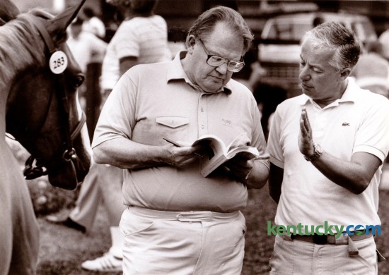 Nelson Bunker Hunt, left, and Bloodstock agent Eugenio Colombo at the Fasig-Tipton Summer Yearling Sales in1985. Hunt, the former Texas billionaire, owned horses and farmland in seven Kentucky counties including the 257-acre Bluegrass Farm at Versailles Road and Man o' War Boulevard. Hunt, 88,  died in Dallas Tuesday October 21. Photo by Ron Garrison | Staff