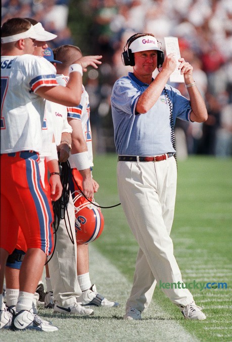 Florida coach Steve Spurrier tries to block the late afternoon sun during his Gators' 55-28 win over Kentucky Sept. 27, 1997 in Lexington. Spurrier was 12-0 against the Wildacts while at Florida. At South Carolina, Spurrier is 8-1 with the lone loss coming in 2010. Photo by Janet Worne | staff