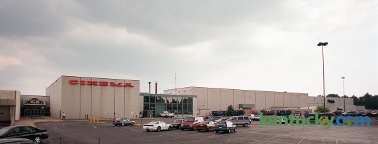 The backside of Turfland Mall, located on Harrodsburg Road in Lexington, July 10, 1998. The mall was Lexington's first enclosed shopping space when it opened in 1967. It closed in 2008. Part of the mall was converted into a Home Depot. The McAlpin's store shown on the right side of this picture later turned into a Dillards. Today, construction continues on turning that part of the mall into a new UKHealthCare facility.