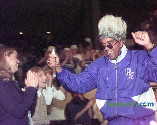 University of Kentucky men's basketball coach Tubby Smith entered Memorial Coliseum Oct. 16, 1998 dressed as boxing promoter Don King as part of the Midnight Madness "Main Event." The 17th annual Midnight Madness, which signals the start of the team's practice, drew its usual capacity crowd of 8,700. The coach of the national defending champions said he was nervous because he felt like anyone else in the stands - not knowing how his team will do this year. Photo by Janet Worne | staff