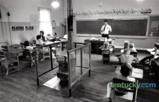 Teacher Meredith Slone surveyed his 18 pupils at Daniels Creek School in Banner, Ky., Tuesday, August 24, 1982. Daniels Creek School, which began its 59th school year the day before, was one of only three one-room schools remaining in Kentucky at the time. The school offered grades one through eight. The school was closed at the end of the 1986-87 school year.  Photo by Charles Bertram | Staff