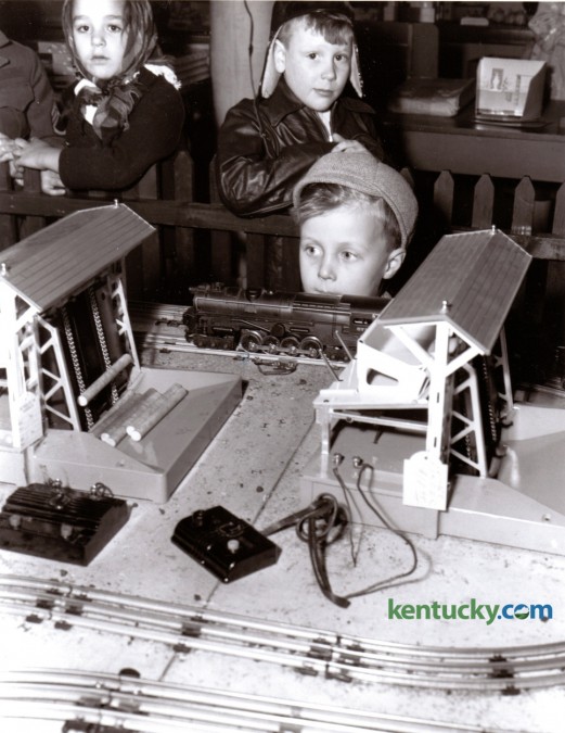 Robert Rodgers, 4, son of Mr. and Mrs. R.G. Rodgers of Addison Ave in Lexington looked at a model train display during the Christmas season, December 1947. Published in the Lexington Herald December 24, 1947. 