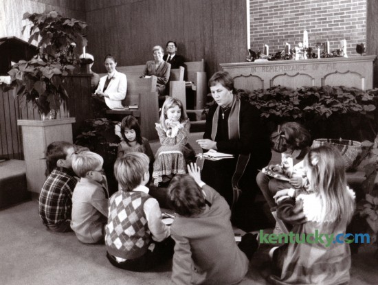 Reverend Jan Ehrmantraut talked to children during the Children's Moment at Sunday morning worship service at Antioch Christian Church in Lexington, December 14, 1986. Photo by John C. Wyatt | Staff