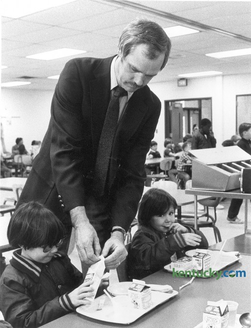 George McKenzie, principal at Ashland Elementary School in Lexington,  helped a student open his cereal box on April 15, 1985. McKenzie arrived at the school that morning to see a banner proclaiming him outstanding principal for the 7th PTA District. Photo by John C. Wyatt | staff