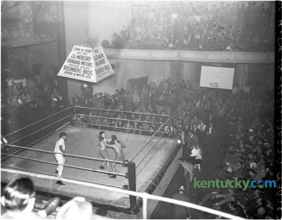 Al view of the ring and crowd during the George Johnson, Willard Huddleston fight, Feb. 3, 1948 during the Herald-Leader Golden Gloves tournament at Woodland auditorium. The auditorium, showcasing everything from professional wrestling to piano performers on the classical music circuit, was built about the turn of the century. It was condemned for public use in 1952 and was torn down sometime in the 1970s. It stood near the corner of East High Street and Kentucky Avenue. Herald-Leader Archive Photo