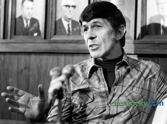 Actor Lenoard Nimoy spoke at Eastern Kentucky University on Feb. 16, 1978. Nimoy was known for his role as Mr. Spock in the "Star Trek" TV series and movies. When he spoke at EKU in Richmond, filming for the science-fiction series had been completed 10 years ealier. But Nimoy told the crowd, "it's had an amazing afterlife." As proof, a boy about 4 or 5 years old slipped down the aisle to the Hiram Brock Auditorium stage and called for Nimoy to hold him. Nimoy picked him up, carried him to the microphone and said, "See, there is magic in the character. There are lots of reasons to respond to Spock. ... we all sense his dignity." Photo by David Perry | staff