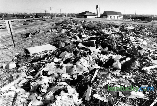 An illegal dump site Feb. 9, 1984 at the corner of Tates Creek and Redding Roads in Lexington. Tates Creek Road runs left to right across the top of the picture. The site is now a Fifth Third Bank branch and a Cheddar's Casual Café. Photo by Charles Bertram | staff