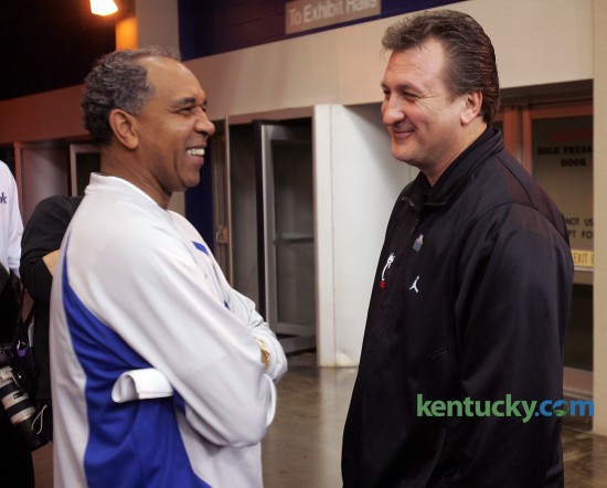 University of Kentucky basketball coach Tubby Smith, left, jokes around with Cincinnati coach Bob Huggins before the Wildcats took the floor for practice March 16, 2005 at the RCA Dome in Indianapolis. Three days later after beating Eastern Kentucky in the first round, Kentucky won it's second-round matchup against Huggins' Bearcats, 69-60. The Wildcats would later lose in the regional finals to to Michigan State in double overtime. Photo by Mark Cornelison | staff