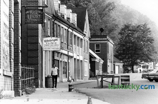 Downtown Wheelwright, located in Floyd County, Aug. 7, 1979. At the time of this photo, a little over 800 people lived in the Eastern Kentucky town. Today it is about the same. The town was founded by the Elk Horn Coal Company in 1916 and was named for the company's president at that time, Jere H. Wheelwright. The building with the Wheelwright Clinic sign has since been torn down. Photo by Byran Lutz