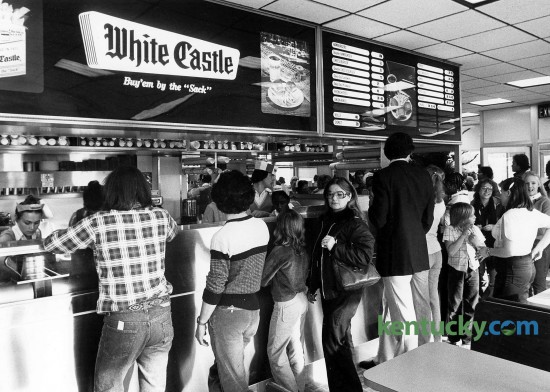 Crowds lined up inside and stretched out the door at the opening of Lexington's first White Castle restaurant Dec. 1, 1980. One day shortly after it's opening, this location at New Circle and Bryan Station roads sold 47,000 hamburgers - at 26 cents a piece. Almost exactly one year later, a second location opened on East Reynolds Road. Photo by Charles Bertram | staff