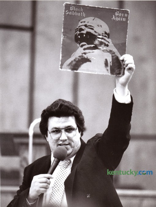 Michael Watson, an evangelist from Buhl, Ala., held up a Black Sabbath album January 10, 1986 during a revival at the Winchester Church of God Cathedral entitled "Rock of the 80's - A Christian Perspective on Rock Music." The revival also featured the burning of rock records and tapes.  Photo by David Perry | Staff