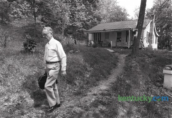 Dr. Mack Roberts making a house call on Span Hill in Monticello, Ky. in the summer of 1987. Dr. Roberts practiced medicine in Wayne County for 61 years until his retirement in 1993. He died in March of 2001 at the age of 97. Dr. Roberts  continued making house calls until his retirement. Photo by Charles Bertram | Staff