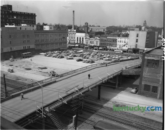 View from the Fred Bryant Motor Company on High Street of the Walnut Street viaduct and the empty lot where the former Union Station stood.   On May 9, 1957, the last passenger train departed from Lexington's Union Station.  The station was closed due to high operating overhead and low passenger travel. In March 1960, the building was demolished. Published in the Lexington Leader April 15, 1960. Herald-Leader Archive Photo
