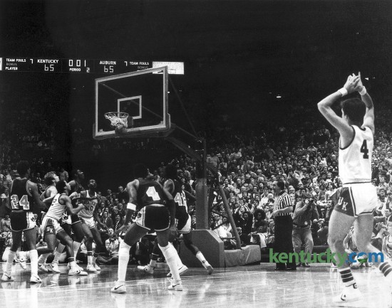 University of Kentucky's Kyle Macy, right, watched as his game-winning, last second shot January 2, 1980 against Auburn in Rupp Arena goes down. The Cats won 67-65 behind Macy's game-high 21 points on 9 of 13 shooting. Photo by E. Martin  Jessee | Staff