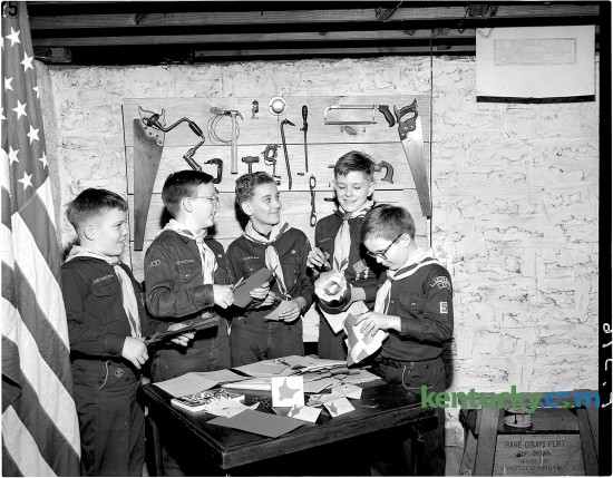 Cub Scout Pack Number 5 of Woodland Christian Church plans a potluck supper, Feb. 1951. From left, Joe White, Paul Reed, Tommy Treumpy, Fred Smith and A. C. Stagg Jr. published 2/21/1951. Herald-Leader archive photo