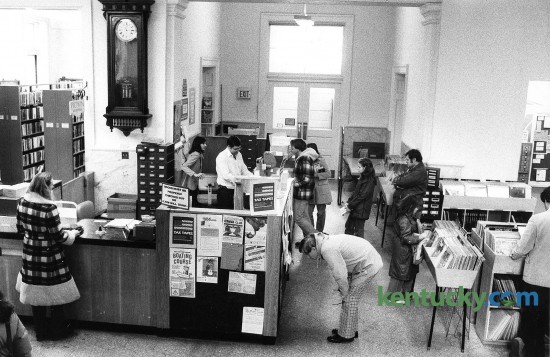 The check-out desk at the Lexington's Public Library's main branch on West Second Street, Feb. 6, 1982. The library moved to its current Central Library location at 140 East Main Street in April, 1989. The new $9.4 million branch was 110,400 square feet of space, compared with the old library's 18,000 square feet. The old location, which was built with a 1902 grant from millionaire-philanthropist Andrew Carnegie, is now the Carnegie Center for Literacy and Learning. Photo by Ron Garrison | staff
