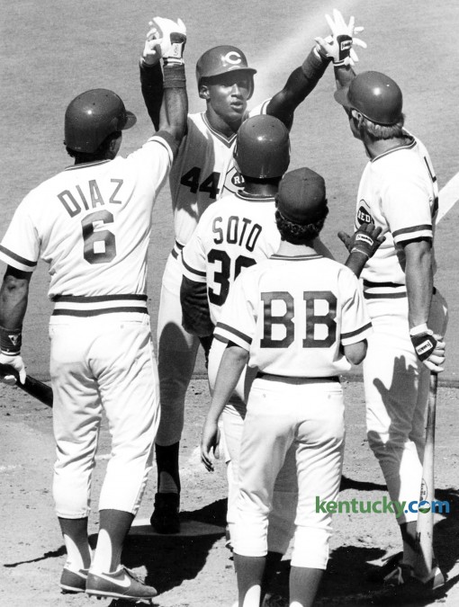 Cincinnati Reds outfielder Eric Davis (No. 44) is congratulated by his teammates after hitting a three-run home run off Steve Carlton in the second inning of the opening-day game of the major leauge baseball season April 7, 1986 at Riverfront Stadium in Cincinnati. The Reds won the game 7-4 and went on to finish second in the National League's West Division, 10 games behind Houston. Davis, who was inducted into the Reds Hall of Fame in 2005, was a two-time All-Star and three-time Gold Glove winner. Photo by Frank Anderson | staff