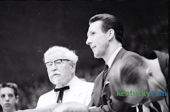 Col. Harland Sanders, founder of Kentucky Fried Chicken, and Adrian Smith, a member of UK's Fiddlin Five that won the 1958 national championship, attend the Kentucky-Vanderbilt basketball game, Jan. 15, 1966 at Memorial Colesium in Lexington. Herald-Leader archive photo.