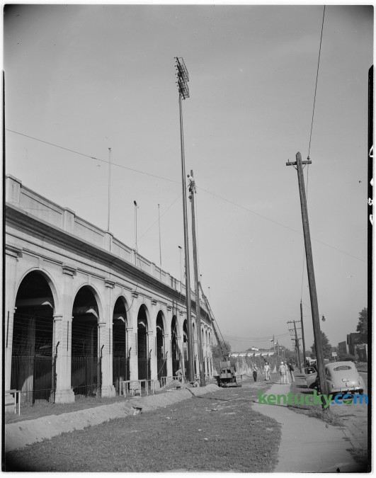 One of six 100-foot steel poles erected on Stoll Field for illumination of night football games in September of 1946. The field has been in use since 1880, but the concrete stands were opened in October 1916, and closed following the 1972 season, replaced by Commonwealth Stadium. Published in the Lexington Leader September 16, 1946. Herald-Leader Archive Photo.