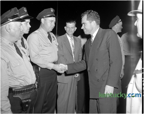 Vice President Richard Nixon, right, shakes hands with Fayette County Patrolman Ted Hughes on Oct. 8, 1954. Also pictured from left are Patrol Lieutenant James Bivens, Patrolman George Mulberry and Assistant Chief Leo Kelly. At the time of this photo, Nixon was less than a year into serving as Dwight D. Eisenhower's vice president. He later became the 37th president of the United States. Herald-Leader archive photo