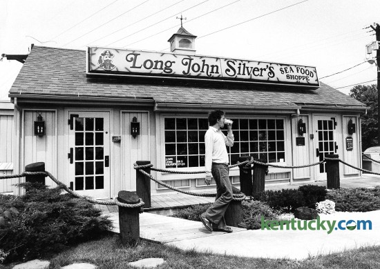 Gene Stathas leaves after dinning June 8, 1981 at the very first Long John Silver's location at 301 Southland Drive in Lexington. Origionally called the Cape Codder, Jerrico Inc. renamed it Long John Silver's and opened for business on Aug. 18 1969. Lexington-based Jerrico also operated Jerry's restaurants and founded Fazoli's. Jerrico was taken private in 1989 in a $626 million leveraged buyout, leaving Long John Silver's with $275 million in high-interest debt. The company struggled with the debt, and Long John Silver's sought bankruptcy protection in June 1998. A year later, A&W bought the chain for $220 million and then was bought by Louisville-based Yum Brands several years later. Private investors made a successful bid to buy the LJS Brand in September 2011. There are currently just over 1,100 locations worldwide, however this origonal location is now a styling salon. Photo by Charles Bertram | staff
