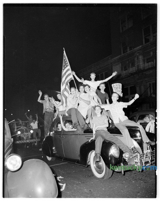 A group of teenagers pilled on a car in downtown Lexington, Aug. 15, 1945 during Victory over Japan Day, or V-J Day as it was commonly known . V-J Day marked the end of WWII, and the cessation of fighting against Japan. It is also called "Victory In Japan Day or "Victory Over Japan Day". Herald-Leader Archive Photo