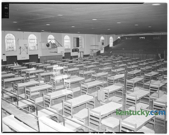 The University of Kentucky gymnasium was converted into temporary sleeping barracks to accommodate 400 of the 2,500 students arriving for opening of Freshman Week in Sept. 1946.