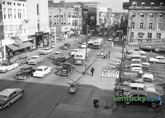 Two-way traffic on East Main Street in downtown Lexington looking towards the east in May of 1956. The building in the upper right corner is the Lafayette Hotel. It closed in 1963 and is now the offices of the Lexington Fayette County Urban County Government. Walnut Street, now called Martin Luther King Boulevard, runs next to the Lafayette Hotel. The parking lot on the left side is now the Fayette County Clerk's Office. The site of the Chase Bank Building located today in Lexington, is in the area of the picture where you see the Bradley's Drugs, Sears and Standard Furniture signage. Herald-Leader Staff Photo