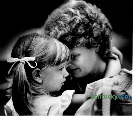 Abby Smits, 6, hugged her mother Virginia just before the start of Abby's first day of first grade at Garden Springs Elementary School on August 21, 1986. Photo by Tim Sharp | Staff