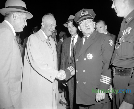 President Dwight D. Eisenhower shook hands with Lexington police Chief E.C. Hale on Oct. 1, 1956, while in Lexington as part of his re-election campaign. After being met at the airport by Kentucky Gov. Happy Chandler, the president’s car rode through downtown in a parade. He later gave a speech at Memorial Coliseum at the University of Kentucky. Hale, police chief from 1953 to 1972, was credited with helping to keep racial tensions in the city from turning violent. Herald-Leader Archive Photo